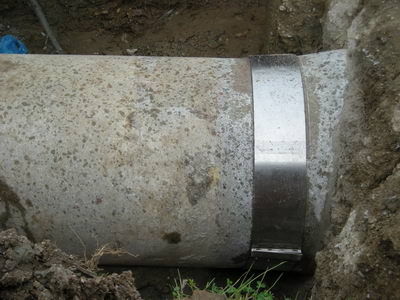 Vitreks - reinforced cement pipe Ø 800 after installation of Pipe repair clamp Atlantik